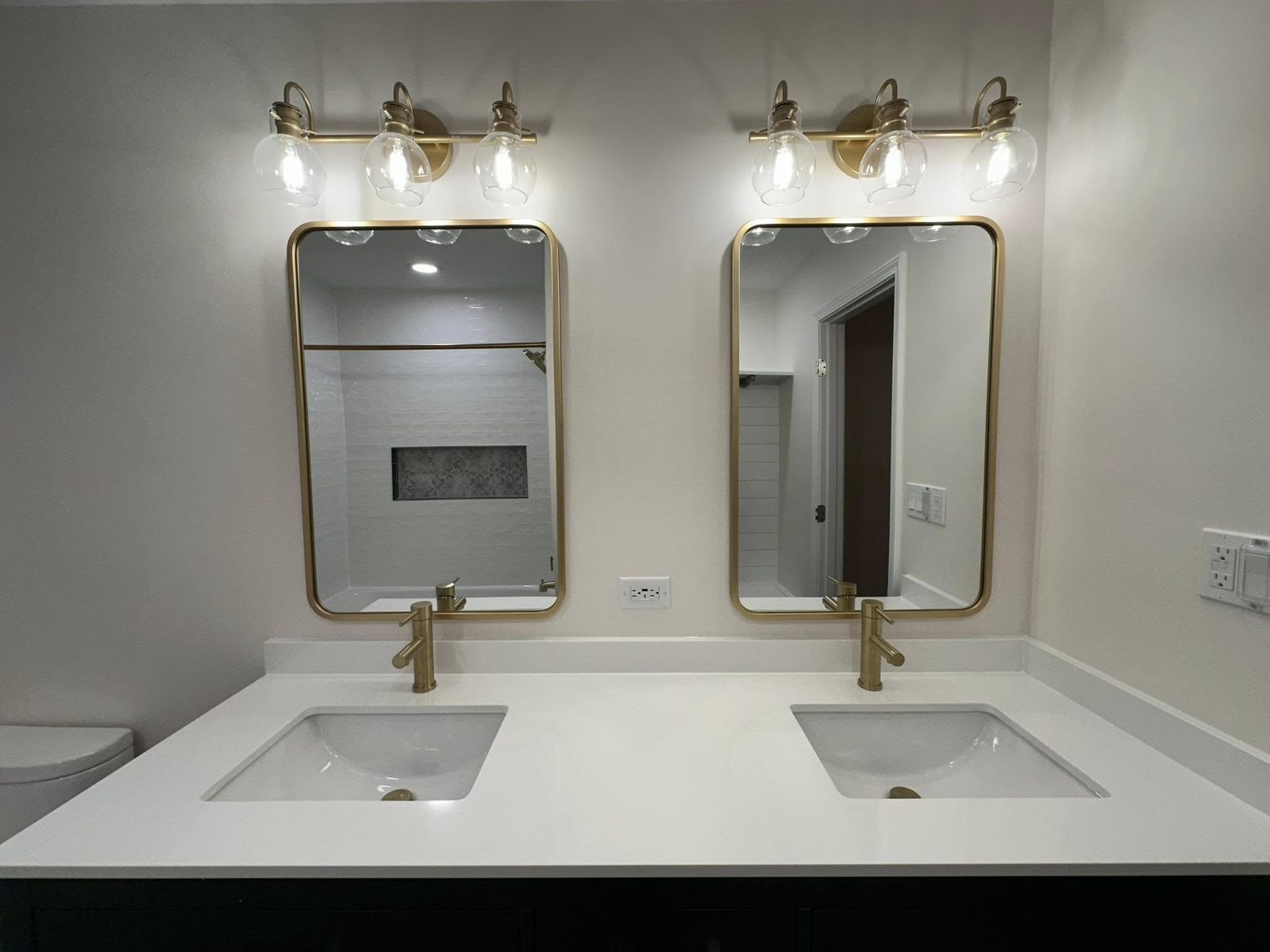 Master bath with a custom double vanity and quartz top