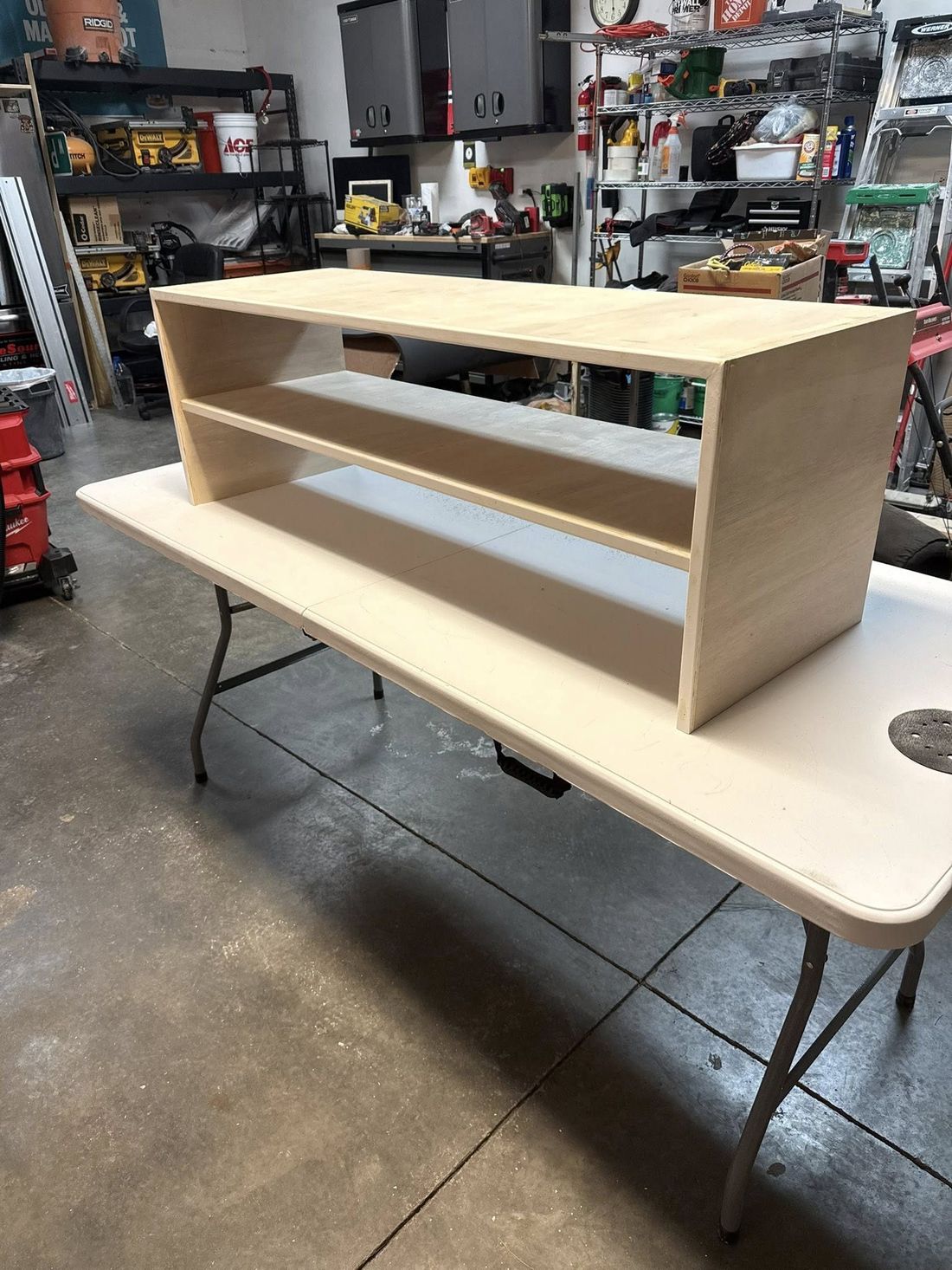 Raw plywood bench body in the shop